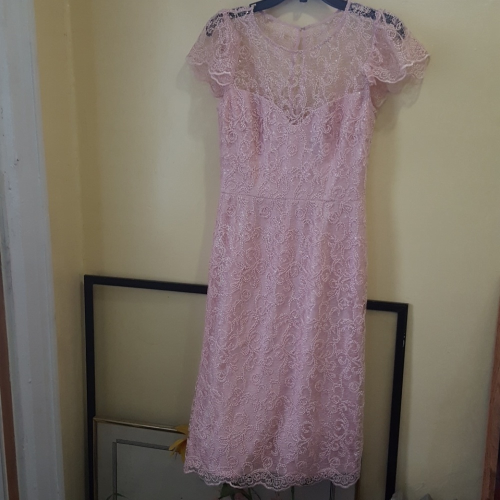 It's a coral lace business  casual dress